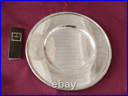 1 assiette de presentation en métal argenté Christofle modèle perles