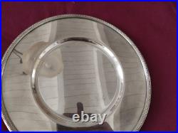 1 assiette de presentation en métal argenté Christofle modèle perles