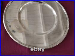 1 assiette de presentation en métal argenté Christofle modèle perles
