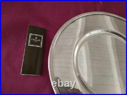 1 assiette de presentation en métal argenté Christofle modèle perles