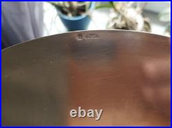 1 assiette de presentation en métal argenté Christofle modèle perles