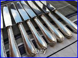 10 couteaux de table manches métal argenté modèle Rubans