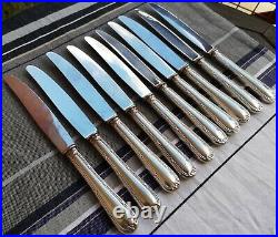 10 couteaux de table manches métal argenté modèle Rubans