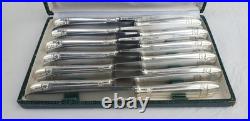 12 Couteaux de table plaqué argent époque Art-déco modèle damier