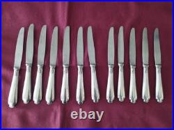 12 couteaux à entremet en métal argenté Christofle alfénide modèle pompadour