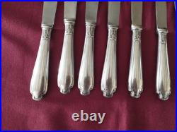 12 couteaux à entremet en métal argenté Christofle alfénide modèle pompadour