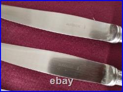 12 couteaux à entremet en métal argenté Christofle alfénide modèle pompadour