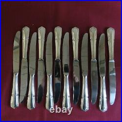 12 couteaux de table en métal argenté CHAMBLY modèle filet contours