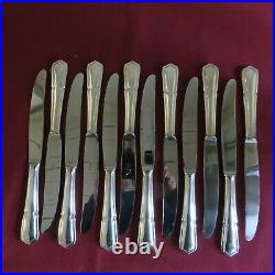 12 couteaux de table en métal argenté CHAMBLY modèle filet contours