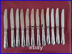 12 couteaux de table en métal argenté Ercuis modèle Louis XV rocaille L2