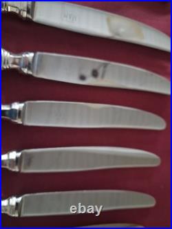 12 couteaux de table en métal argenté SFAM modèle filet chinon