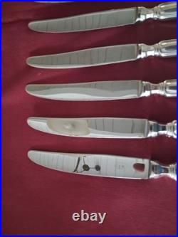 12 couteaux de table en métal argenté SFAM modèle filet chinon
