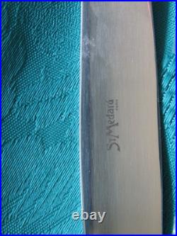 12 couteaux de table en métal argenté Saint Medard modèle Mozart