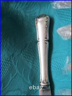 12 couteaux de table en métal argenté Saint Medard modèle Mozart