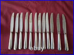 12 couteaux de table en métal argenté christofle modèle America