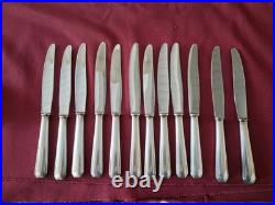 12 couteaux de table en métal argenté christofle modèle America