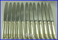 12 couteaux de table modèle Grand Prix, métal argenté, excellent état, écrin
