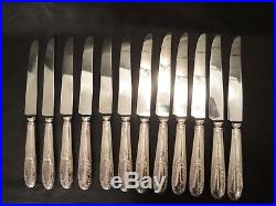 12 couteaux de table modèle louis XV, métal argenté lame inox ecrin