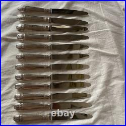 12 couteaux modèle GRAND PRIX DE MONACO métal argenté 21 cm couvert TBE 12 couteaux modèle GRAND PRIX DE MONACO métal argenté 21 cm couvert TBE