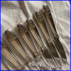 12 couteaux modèle GRAND PRIX DE MONACO métal argenté 21 cm couvert TBE 12 couteaux modèle GRAND PRIX DE MONACO métal argenté 21 cm couvert TBE