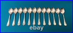 12 cuillères à glace CHRISTOFLE modèle RUBANS CROISÉS métal argenté 13 cm