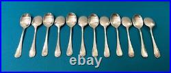 12 cuillères à glace CHRISTOFLE modèle RUBANS CROISÉS métal argenté 13 cm