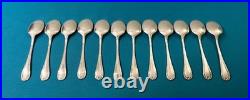 12 cuillères à glace CHRISTOFLE modèle RUBANS CROISÉS métal argenté 13 cm
