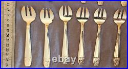 12 fourchettes à huitres en métal argenté modèle art déco Grand Prix