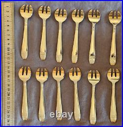 12 fourchettes à huitres en métal argenté modèle art déco Grand Prix