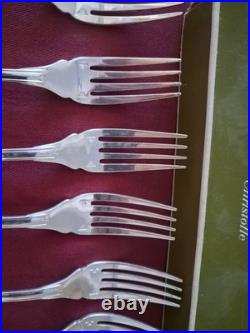 12 fourchettes à poisson en métal argenté modèle coquille Vendôme