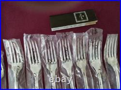 12 fourchettes de table en métal argenté christofle modèle Versailles sous blist