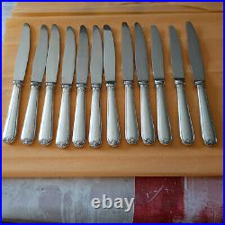 12 grands couteaux de table en métal argenté CHRISTOFLE modèle BERAIN avant 1935