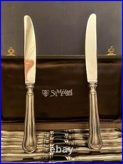 12 grands couteaux en métal argenté modèle filet violoné Saint Médard