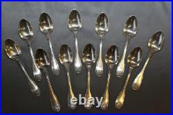 12 petites cuilléres en métal argenté Christofle modèle coquille