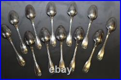 12 petites cuilléres en métal argenté Christofle modèle coquille