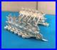 6-portes-couteaux-CHRISTOFLE-modele-CHRYSANTHEMES-metal-argente-Couvert-Table-01-qnp