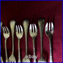 9 fourchettes à huitres en métal argenté modèle rubans 2
