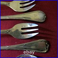 9 fourchettes à huitres en métal argenté modèle rubans 2