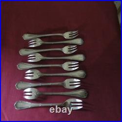 9 fourchettes à huitres en métal argenté modèle rubans 2