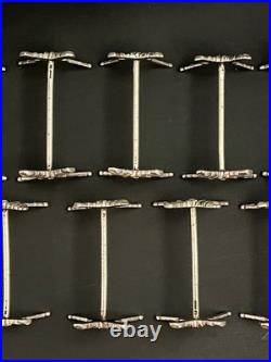 9 porte couteaux en métal argenté modèle carquois flambeau