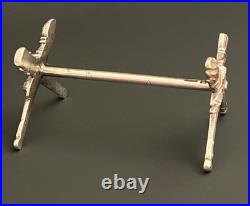 9 porte couteaux en métal argenté modèle carquois flambeau