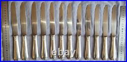 ALFENIDE / CHRISTOFLE 12 couteaux de table en métal argenté modèle POMPADOUR
