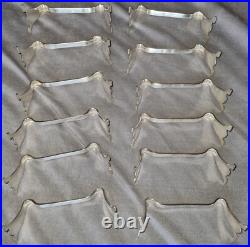 ARGENTAL 12 porte couteaux en métal argenté Modèle art déco proche America