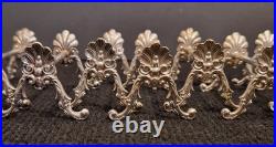 Alfénide lot de 12 porte-couteaux modèle coquille TBE métal argenté