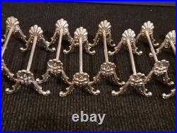 Alfénide lot de 12 porte-couteaux modèle coquille TBE métal argenté