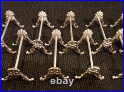 Alfénide lot de 12 porte-couteaux modèle coquille TBE métal argenté