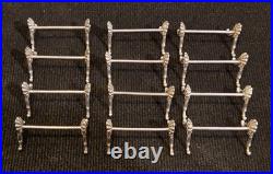 Alfénide lot de 12 porte-couteaux modèle coquille TBE métal argenté