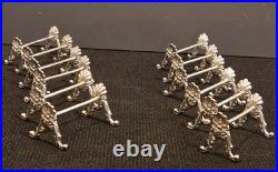 Alfénide lot de 12 porte-couteaux modèle coquille TBE métal argenté