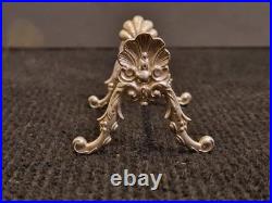 Alfénide lot de 12 porte-couteaux modèle coquille TBE métal argenté