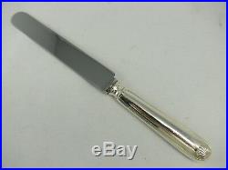 Boulenger, 12 couteaux de table modèle Coquille, métal argenté, écrin d'origine